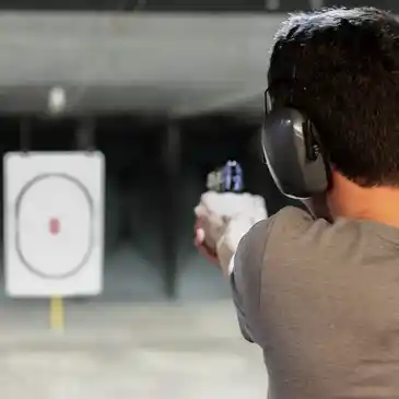 man shooting at range